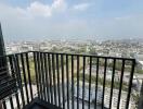 View from apartment balcony overlooking cityscape