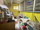 Small enclosed storage area with various household items