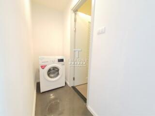 Laundry room with washing machine