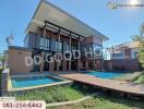 Modern two-story house with pool and garden