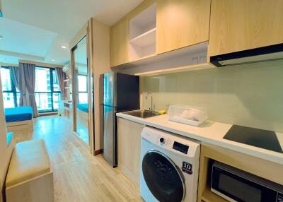 Compact modern kitchen with built-in appliances