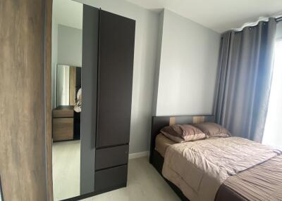 Bedroom with bed and wardrobe