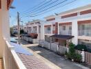 View of a row of townhouses from a balcony