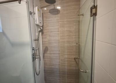 Modern shower area with glass doors