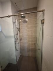 Modern shower area with glass doors