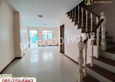 Spacious main living area with staircase