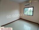 Empty bedroom with tiled floor and window