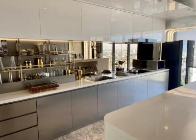 Modern kitchen with sleek cabinetry and appliances