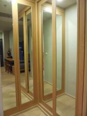 Hallway with Mirrored Closets