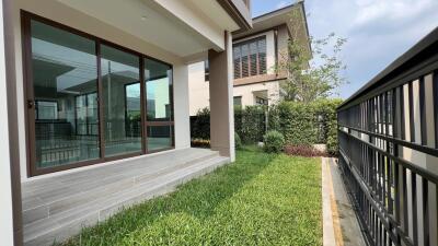 View of the patio and garden of a modern house