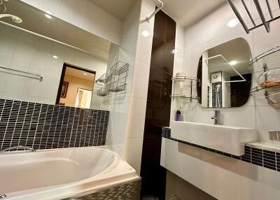 Modern bathroom with large bathtub and contemporary fixtures