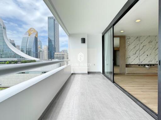 Balcony with city views and sliding glass doors