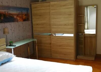 Bedroom with wardrobe and desk