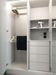 Closet with shelves and hanging space