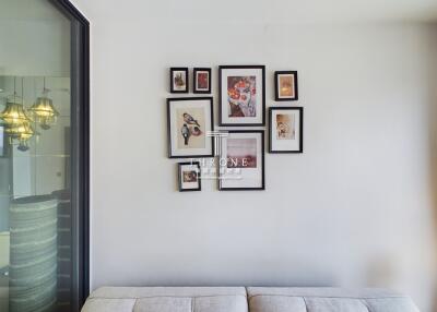 Wall with picture frames in a living area