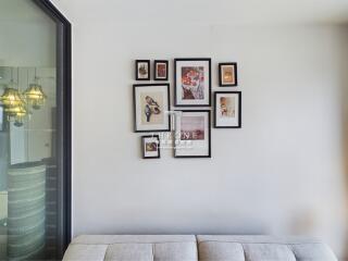 Wall with picture frames in a living area