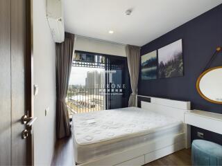 Modern bedroom with a city view