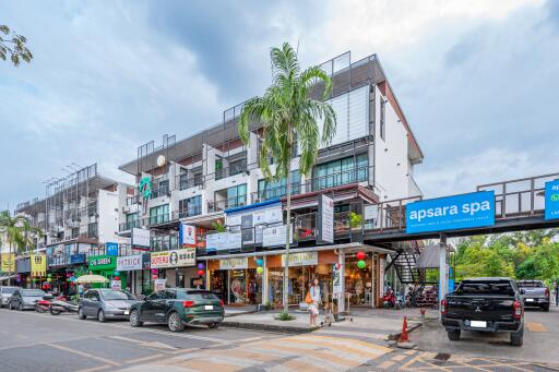 Street view of commercial and residential buildings