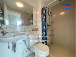 Modern bathroom with shower and toilet