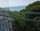 Balcony with ocean view and greenery