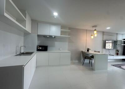 Modern kitchen with adjacent dining area