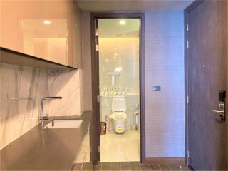 Photo of a bathroom with a glass door