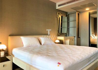 Spacious bedroom with king-sized bed and modern furnishings