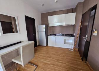 Modern kitchen with clean design and dining area