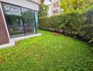 Outdoor green space with view of house