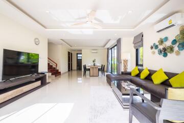 Spacious and bright living area with modern furnishings