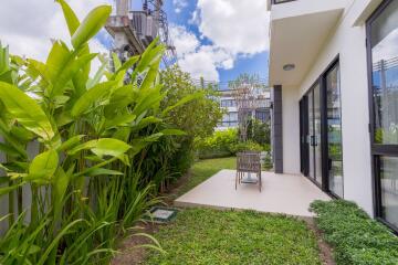 Modern backyard with greenery and patio