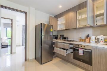 Modern kitchen interior with appliances and open cabinets