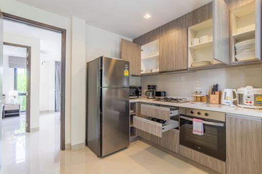 Modern kitchen interior with appliances and open cabinets