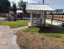 Outdoor seating area with gazebo and garden