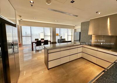 Modern kitchen with open layout to dining and living area