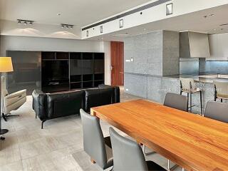 Modern living room with dining area and kitchen