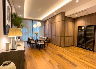 Modern dining area with contemporary furniture and wooden flooring