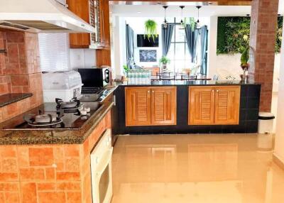 Spacious and modern kitchen with dining area