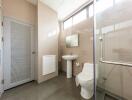 Modern minimalist bathroom with glass-enclosed shower