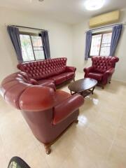 Living Room with Red Leather Furniture