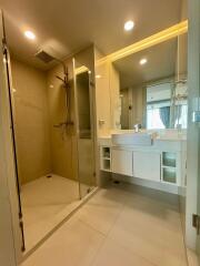 Modern bathroom with glass shower and vanity