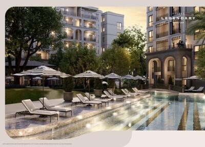Luxurious apartment complex with outdoor pool and lounge chairs
