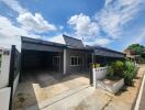 Image of the exterior of a house with a carport