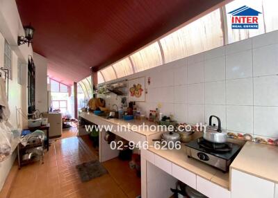 Modern kitchen with built-in appliances and ample counter space