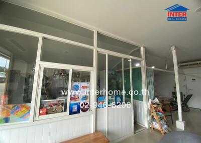 Office area with partitioned glass windows and doors