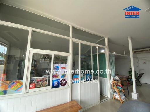 Office area with partitioned glass windows and doors