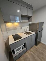 Modern compact kitchen with appliances