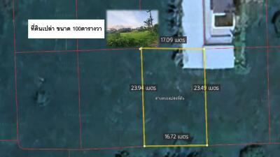 Aerial view of a land plot with dimensions labeled