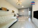 modern living room with white sofa and chandelier