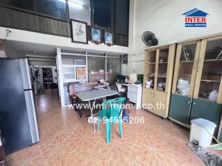 Spacious living area with dining table